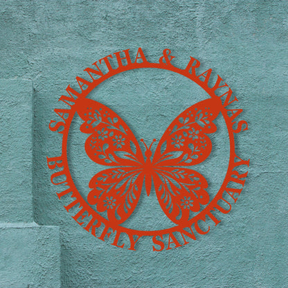 Red butterfly logo with 'Samantha & Raynus Butterfly Sanctuary' text on a teal background
