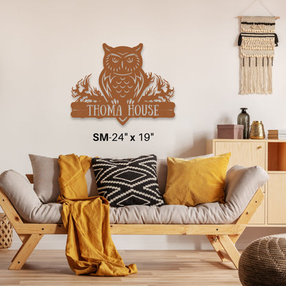 Wooden owl wall decor with 'THOMA HOUSE' text in a living room setting.