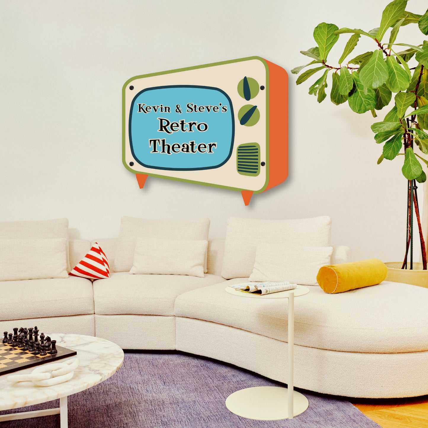 Retro-style wall decoration with 'Kevin & Steve's Retro Theater' text in a living room setting.