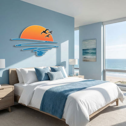 Modern bedroom with a sunset wall art and a view of the ocean.