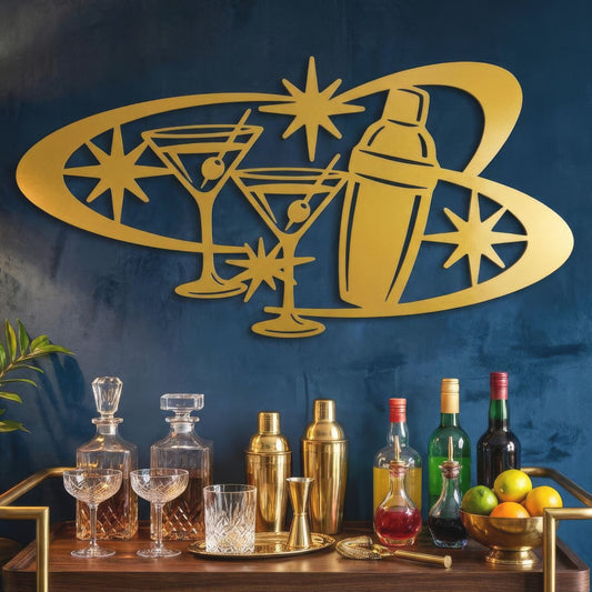 Bar setup with cocktail shakers, glasses, and bottles against a blue wall with a gold bar-themed wall art.