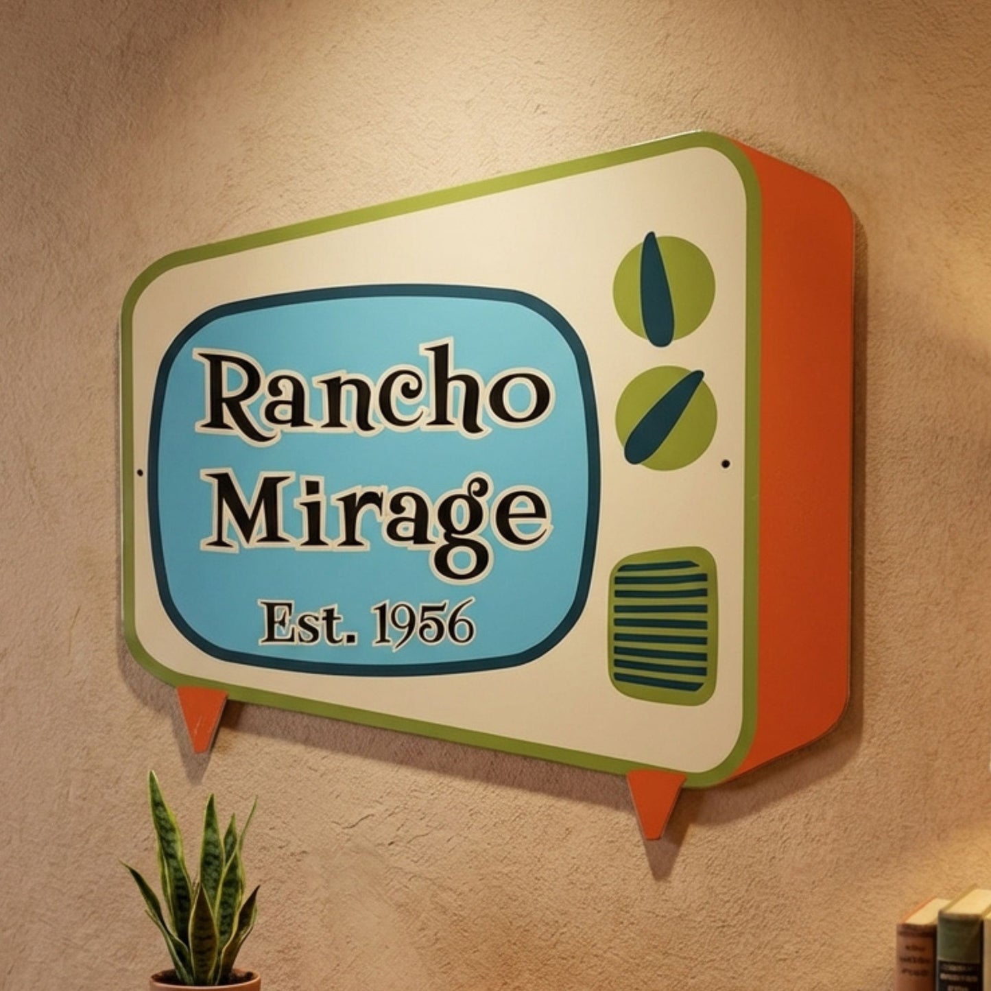 Rancho Mirage established date metal sign hung on wall of mid century modern styled home