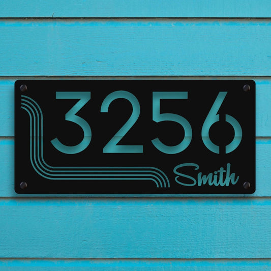 House number sign with '3256 Smith' on a blue wooden background