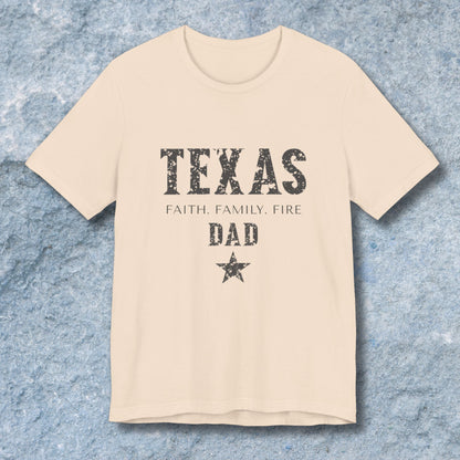 Beige t-shirt with 'TEXAS FAITH. FAMILY. FIRE DAD' text on a textured blue background